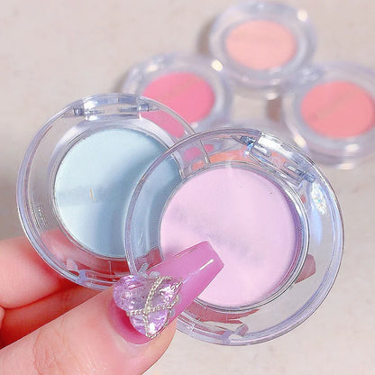 Blush cremoso iluminador monocromático em tons de pêssego.